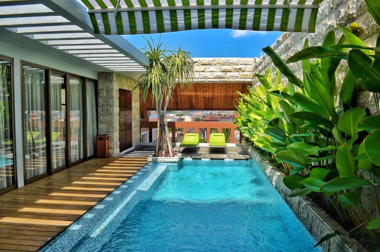 Ts Suites Seminyak  Exterior photo The swimming pool at the hotel